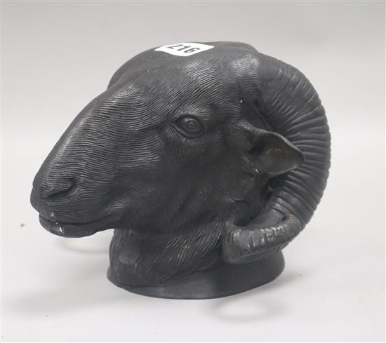 A bronze rams head height 15cm